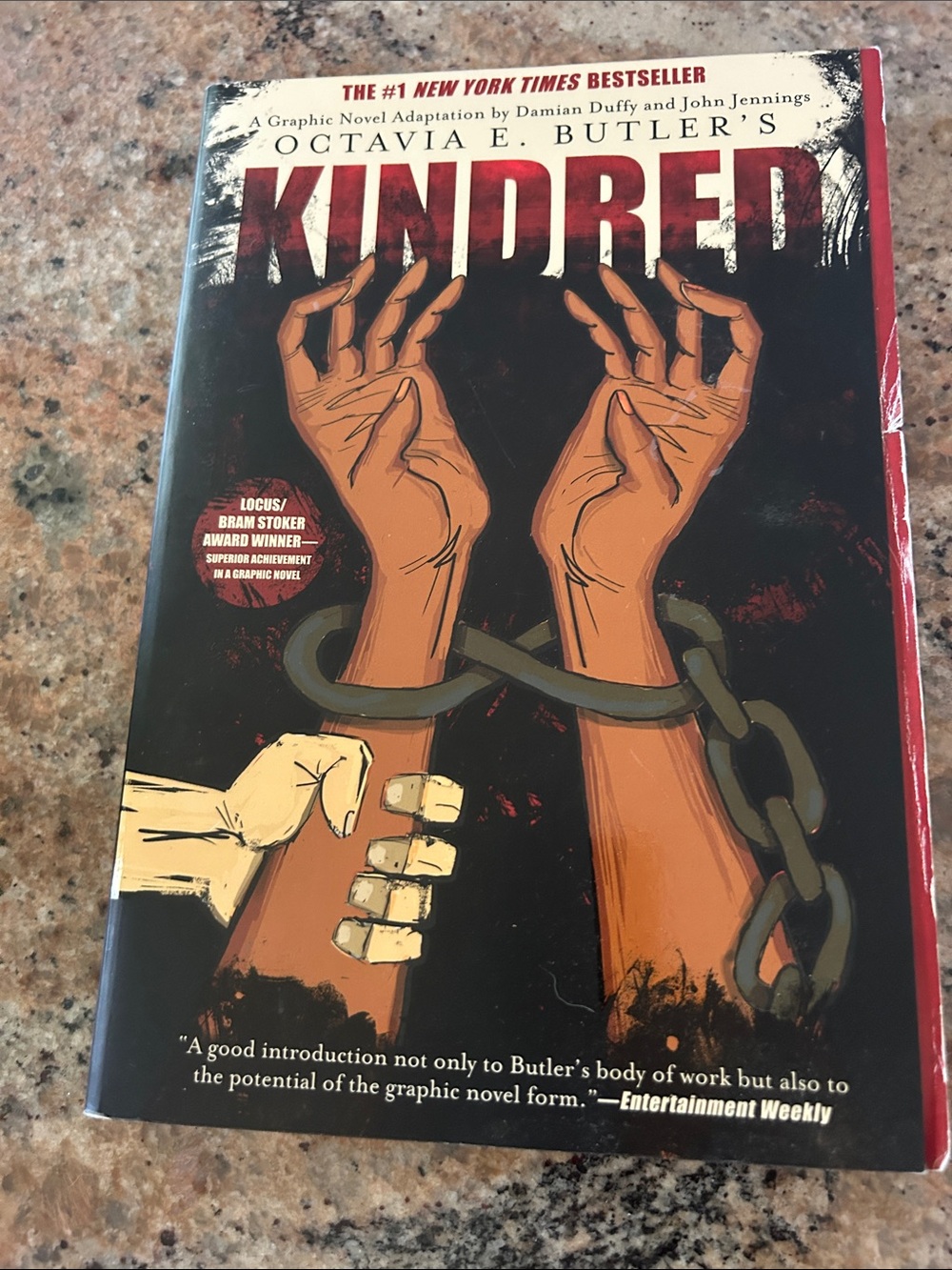 Octavia E. Butler's KINDRED Graphic Novel - Black & Brown Cover